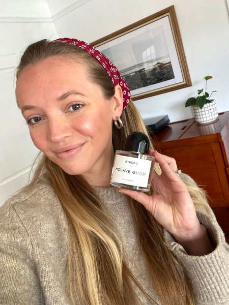Selfie of Ingrid Fowler holding the Byredo Mojave Ghost