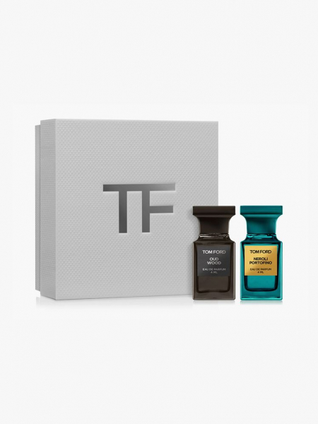 Tom Ford Oud Wood & Neroli Portofino Eau de Parfum Discovery Set two bottles of perfume and gray box on light gray background
