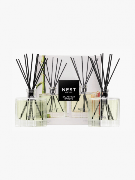 Nest New York Grapefruit & Bamboo Reed Diffuser Set in branded components on a light gray background