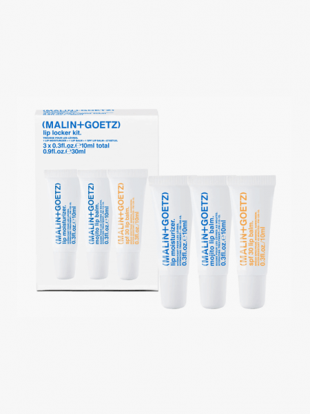 MALIN+GOETZ Lip Locker Kit in branded tube components on a light gray background