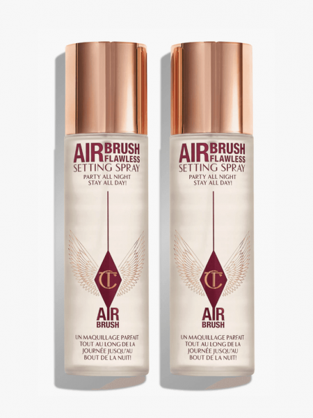 Charlotte Tilbury Airbrush Flawless Finish Setting Spray Duo in branded bottle components on a light gray background