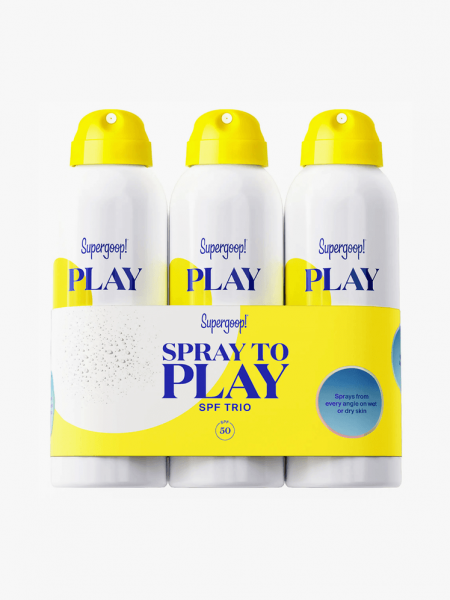 Supergoop! Spray to Play SPF Trio in branded components on a light gray background