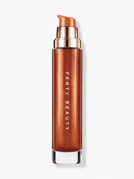 Fenty Beauty Body Lava Body Luminizer bottle of copper body oil on light gray background