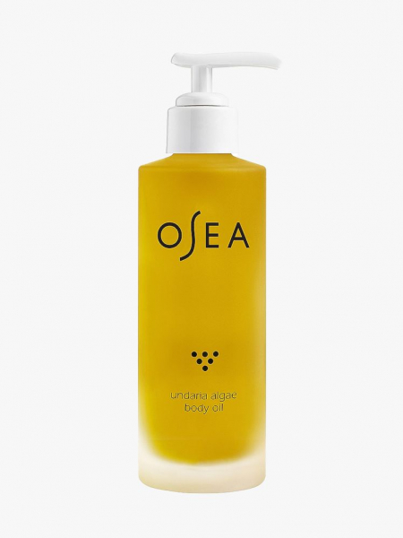 Osea Undaria Algae Body Oil bottle of gold body oil with white pump cap on light gray background
